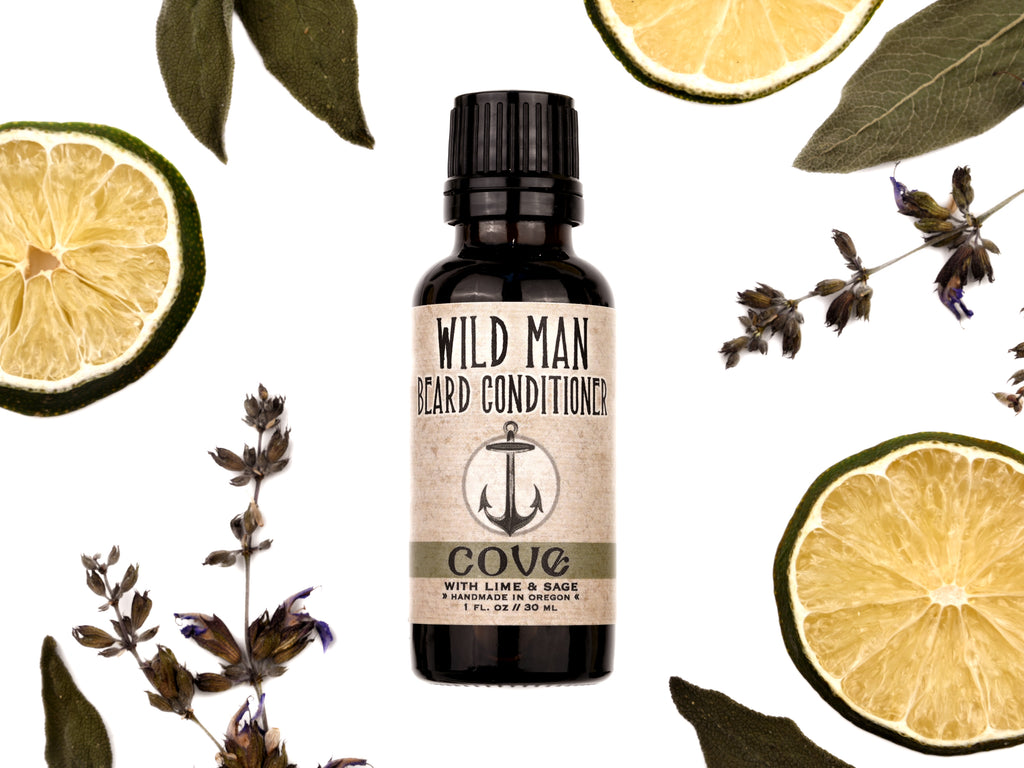 Wild Man Beard Oil Conditioner Cove scent in 30ml amber glass bottle. Lime slices and sage leaves surround.