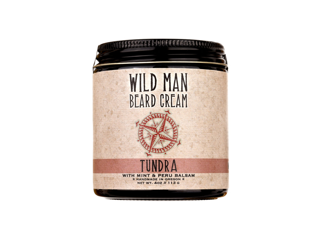 Wild Man Beard Softening Cream Tundra scent in 4oz amber glass jar on white background.