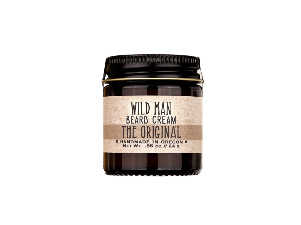 Wild Man Beard Cream in The Original scent shown in a 1oz amber glass jar on a white background.