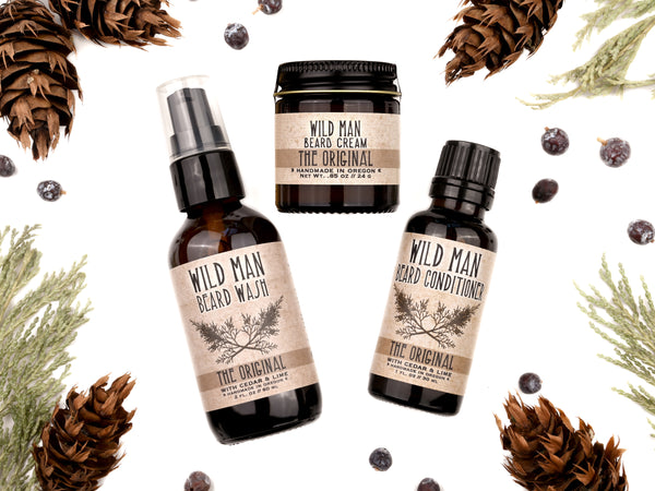 Wild Man Beard Grooming Gift Set in The Original Scent. Dried cedar and fir cones surround.