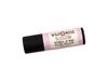 Blossom Lip Balm in a biodegradable paper tube on a white background.