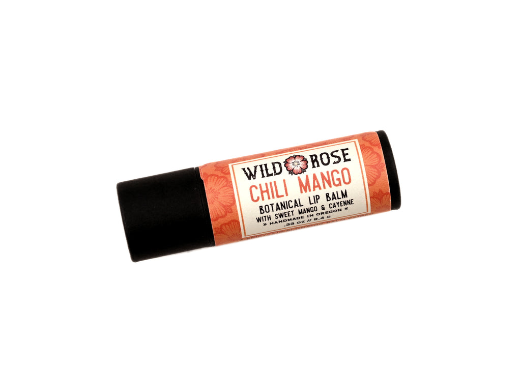 Chili Mango Natural Lip Balm in a biodegradable tube on a white background.