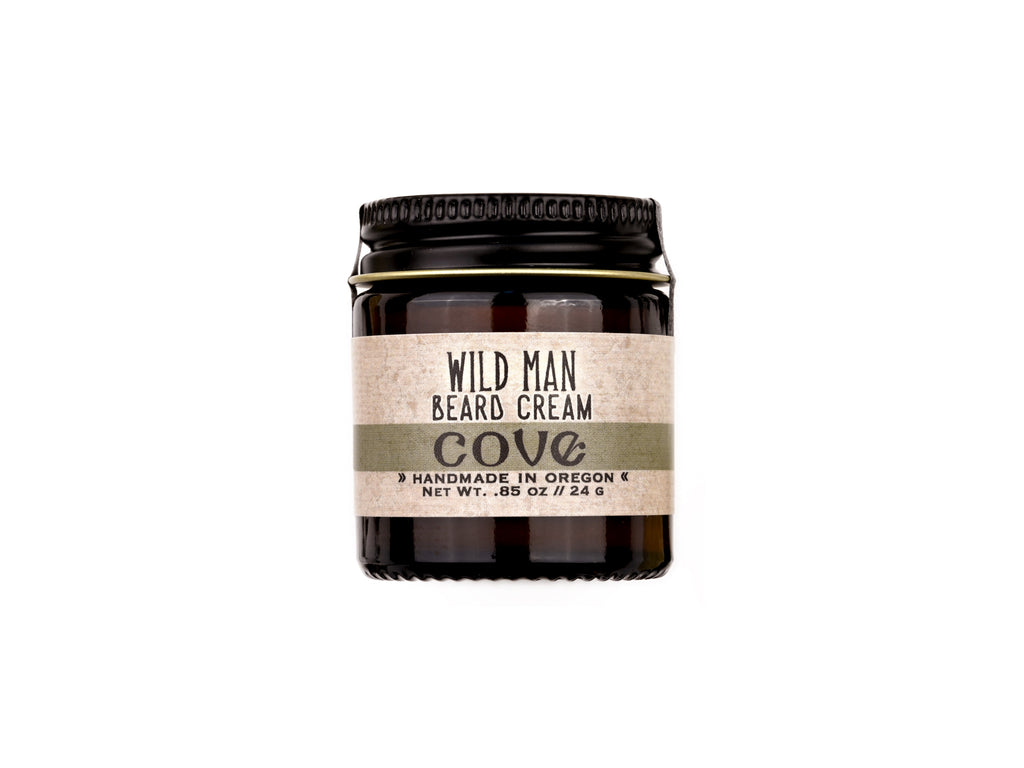 Wild Man Beard Cream Cove scent in 1oz amber jar on white background.