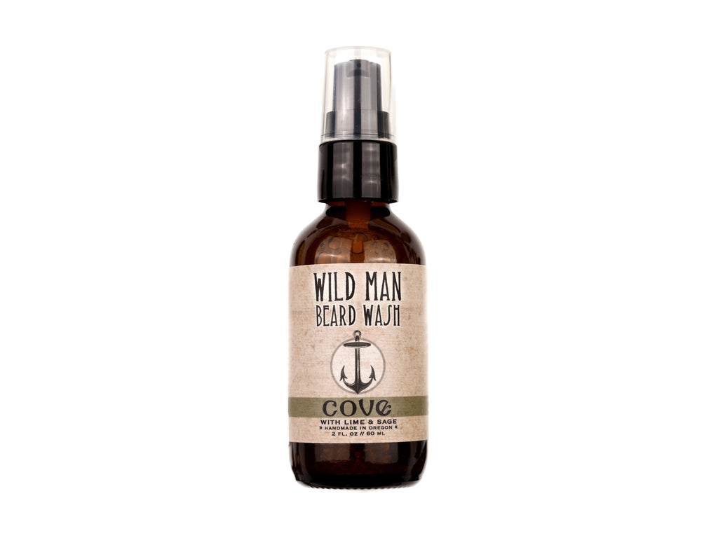 Wild Man Beard Wash Cove scent in 2oz amber bottle on white background.
