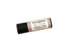 Hot Cocoa Natural Lip Balm in a biodegradable paper tube on a white background.