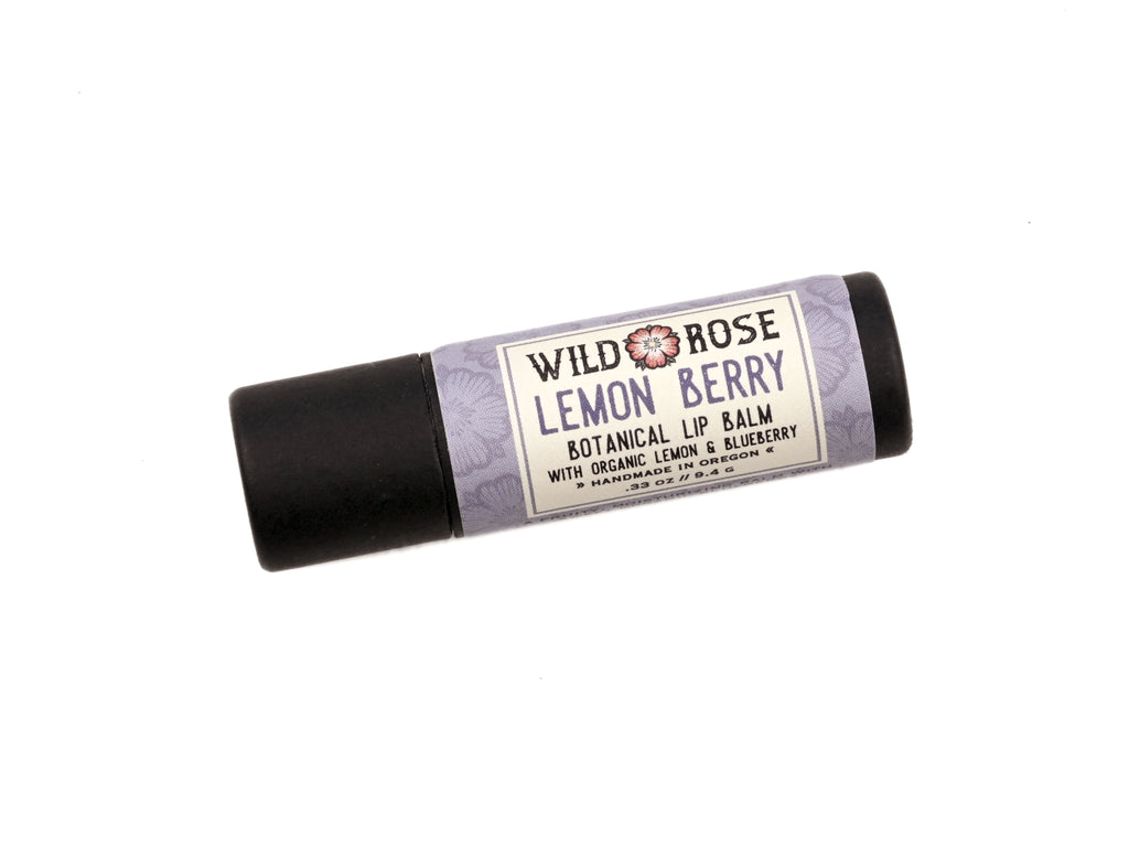 Lemon Berry Lip Balm in a biodegradable paper tube on a white background.