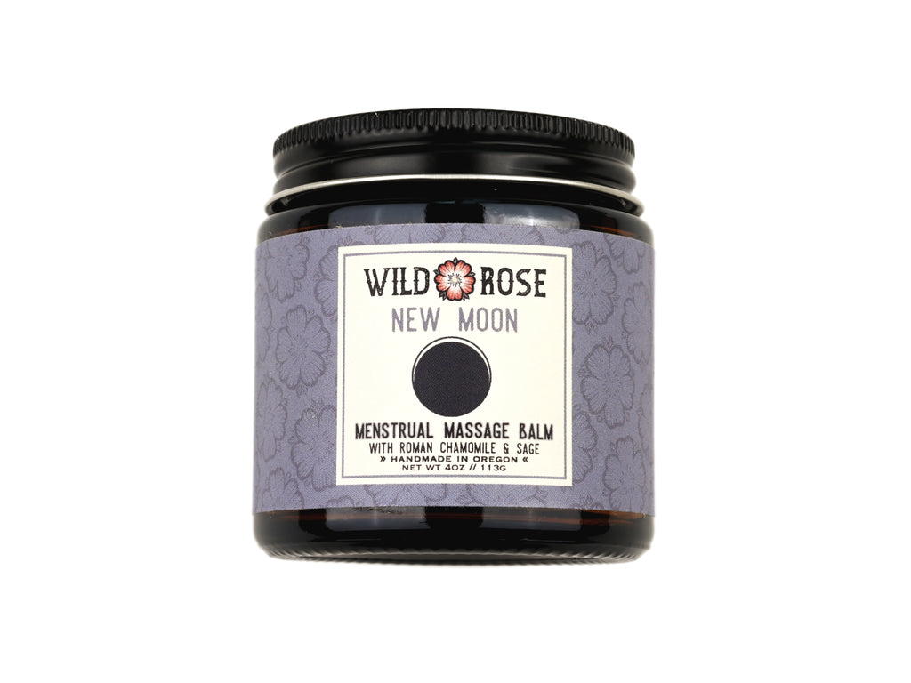 New Moon Menstrual Massage Balm in a 4oz amber glass jar with metal lid on a white background.
