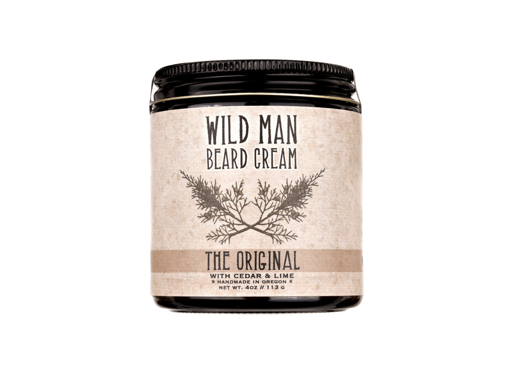 Wild Man Beard Cream in The Original scent shown in a 1oz amber glass jar on a white background.
