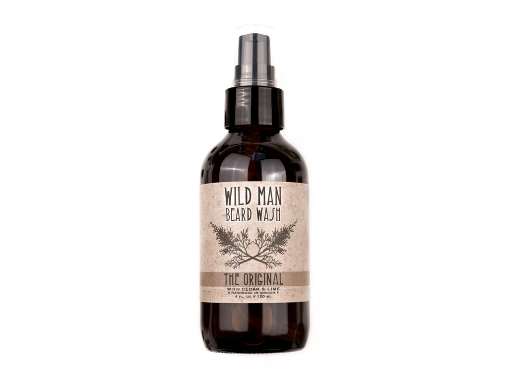 Wild Man Beard Wash in The Original scent shown in a 4oz amber glass bottle on a white background.