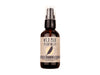 Wild Man Beard Wash - Raven scent in 2oz amber glass bottle on a white background.