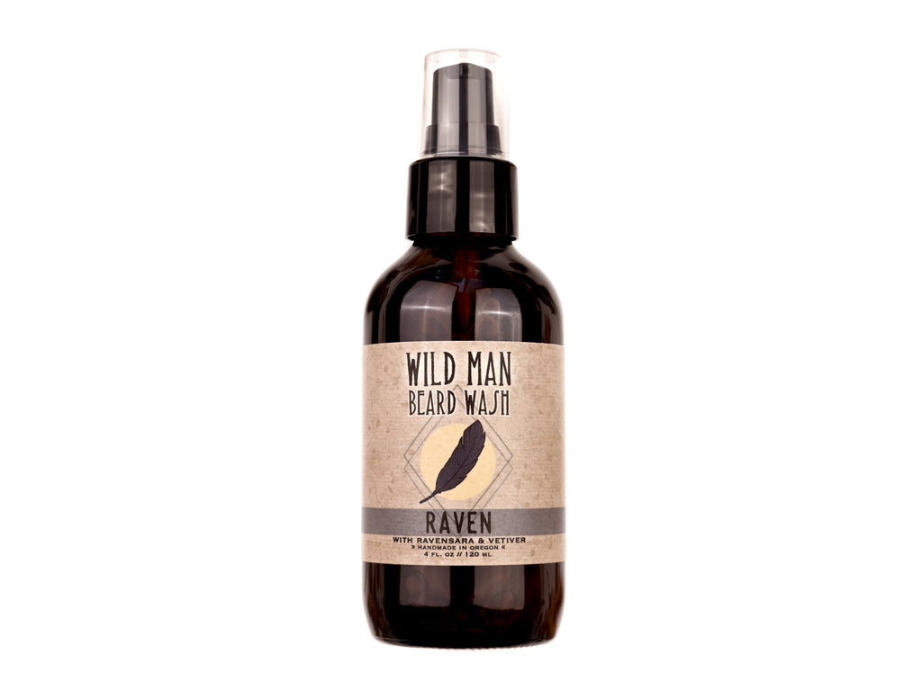 Wild Man Beard Wash - Raven scent in 4oz amber glass bottle on a white background.