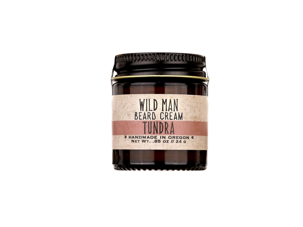 Wild Man Beard Softening Cream Tundra scent in 1oz amber glass jar on white background.