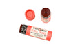 Wild Rose Blood Orange lip and cheek tint in a coral pink tube with a white label, shown with the cap off and the tinted product inside the container on a white background.