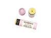 Wild Rose Blossom botanical lip balm shown with its light purple floral tube packaging on a white background. The lid is removed revealing a creamy, light green balm.