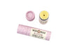 Wild Rose Blossom botanical lip balm shown with its light purple floral tube packaging on a white background. The lid is removed revealing a creamy, light green balm.