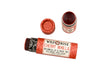 Wild Rose Cherry Vanilla Botanical Lip & Cheek Tint in a biodegradable tube on a white background. The cap is removed revealing a dark red creamy tinted balm.