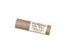 Wild Rose Dark Roast Botanical Lip Balm in a biodegradable tube on a white background. 