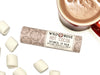 Wild Rose Hot Cocoa Botanical Lip Balm in a biodegradable tube on a white background with marshmallows and a cup of hot cocoa. 