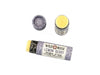 Wild Rose Lemon Berry Botanical Lip Balm in a biodegradable tube on a white background. The cap is removed revealing a creamy yellow balm.