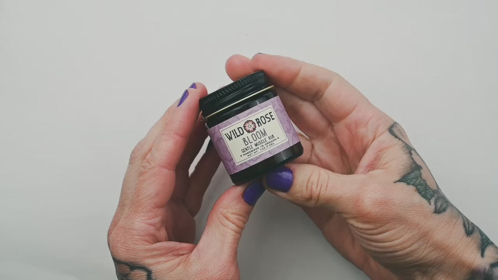 Wild Rose Bloom Gentle Muscle Rub application on the arm.