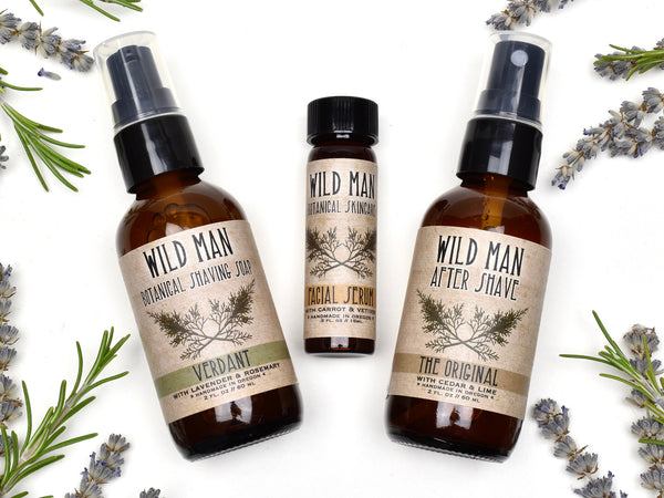 Wild Man Shaving Gift Set with 2oz Shaving Soap, 2oz After Shave and Facial Serum. Dried botanicals surround.